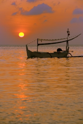boat fishing sunset
